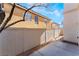 Small backyard with concrete patio and gravel at 10441 Concetta Ave, Las Vegas, NV 89129