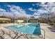 Community swimming pool with surrounding patio and facilities at 10548 Seasonable Dr, Las Vegas, NV 89129