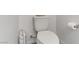 Clean bathroom with toilet and roll holder at 10691 Sariah Skye Ave, Las Vegas, NV 89166