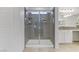 Large walk-in shower with glass doors at 10691 Sariah Skye Ave, Las Vegas, NV 89166