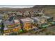 Aerial view of modern Mesa Ridge homes featuring pools, city views and contemporary architecture at 10896 Tranquil Hills Way, Las Vegas, NV 89135