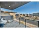 Relaxing balcony with seating area and neighborhood views at 10896 Tranquil Hills Way, Las Vegas, NV 89135