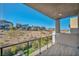 Modern balcony with mountain views and tile flooring at 10896 Tranquil Hills Way, Las Vegas, NV 89135