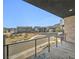 Private balcony overlooking community and mountain views at 10896 Tranquil Hills Way, Las Vegas, NV 89135