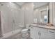 Modern bathroom with a large glass shower, white subway tile, and a vanity at 10896 Tranquil Hills Way, Las Vegas, NV 89135