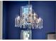 Close-up of the chandelier, creating an ambiance of elegant beauty at 10896 Tranquil Hills Way, Las Vegas, NV 89135