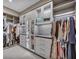 Spacious walk-in closet with shoe and clothing storage at 10896 Tranquil Hills Way, Las Vegas, NV 89135