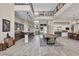 Open concept dining area with a live edge table and seating for 10 at 10896 Tranquil Hills Way, Las Vegas, NV 89135