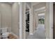 Hallway view into closet and bath at 10896 Tranquil Hills Way, Las Vegas, NV 89135