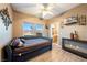 Guest bedroom with daybed and en-suite bathroom at 1411 E Blosser Ranch Rd, Pahrump, NV 89060