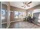 Cozy bedroom with a built-in desk and hardwood floors at 1411 E Blosser Ranch Rd, Pahrump, NV 89060