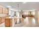 Kitchen with island, stainless steel appliances, and granite counters at 221 Raptors View Ave, North Las Vegas, NV 89031