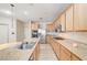 Kitchen featuring granite countertops, stainless steel appliances, and lots of cabinets at 221 Raptors View Ave, Las Vegas, NV 89031