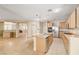 Large kitchen with island, stainless steel appliances, and wood cabinets at 221 Raptors View Ave, North Las Vegas, NV 89031