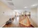 Spacious loft area with wood flooring and natural light at 221 Raptors View Ave, North Las Vegas, NV 89031