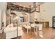 Comfortable living room boasting hardwood floors, spiral staircase, and custom bookcase at 24 Wild Dunes Ct, Las Vegas, NV 89113