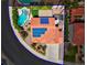 Aerial view of single story home with solar panels, pool, and landscaped yard at 2619 Grey Stone Rd, Henderson, NV 89074