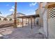 Large backyard with pergola and tile flooring at 2619 Grey Stone Rd, Henderson, NV 89074