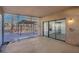 Covered patio with sliding glass doors and lattice walls at 2619 Grey Stone Rd, Henderson, NV 89074