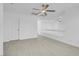 Bedroom with ceiling fan, light wood floors, and access to a loft at 2619 Grey Stone Rd, Henderson, NV 89074