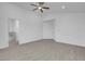 Bright bedroom with ceiling fan and wood-look floors at 2619 Grey Stone Rd, Henderson, NV 89074