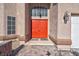 Red double front doors with sidelights and a stone walkway at 2619 Grey Stone Rd, Henderson, NV 89074