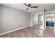 Bedroom with mirrored closet and wood-look floors at 275 Adorno Dr, Henderson, NV 89074