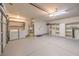 Garage with washer, dryer, and ample storage shelves at 275 Adorno Dr, Henderson, NV 89074