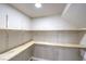 Large walk-in pantry with ample shelving for storage at 275 Adorno Dr, Henderson, NV 89074