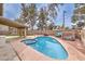 Large kidney-shaped pool with spa and patio at 275 Adorno Dr, Henderson, NV 89074