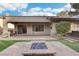 Outdoor living space with fire pit and built-in grill at 3 Glendora Ct, Henderson, NV 89052