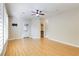 Bright bedroom featuring hardwood floors, a ceiling fan and door to backyard at 3 Glendora Ct, Henderson, NV 89052