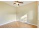 Spacious bedroom with wood-look floors and ceiling fan at 3 Glendora Ct, Henderson, NV 89052