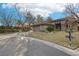 Single-story home with neutral exterior, attached garage, and landscaped yard at 3 Glendora Ct, Henderson, NV 89052