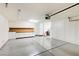 Garage with extensive built-in storage and epoxy flooring at 3 Glendora Ct, Henderson, NV 89052