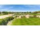 View of a lush green golf course and distant city at 3 Glendora Ct, Henderson, NV 89052