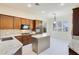 Spacious kitchen with island and granite countertops at 3 Glendora Ct, Henderson, NV 89052