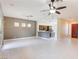 Open concept living area with hardwood floors and a view into kitchen at 3 Glendora Ct, Henderson, NV 89052