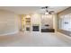 Bright living room with a stone fireplace and hardwood floors at 3 Glendora Ct, Henderson, NV 89052