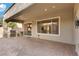 Covered patio with built-in grill and access to backyard at 3 Glendora Ct, Henderson, NV 89052