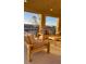 Bright outdoor balcony features plush seating, perfect for enjoying peaceful mornings and great views at 3041 Savella Ave, Henderson, NV 89044