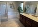 Spa-like bathroom with double sinks, soaking tub, and walk-in shower at 3041 Savella Ave, Henderson, NV 89044