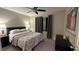 Spacious bedroom with a king-size bed and modern decor at 3041 Savella Ave, Henderson, NV 89044