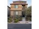 Two-story house with front yard landscaping and stairs at 3041 Savella Ave, Henderson, NV 89044