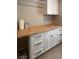 Laundry room featuring built-in cabinets and countertop at 3041 Savella Ave, Henderson, NV 89044