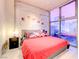 Bright bedroom with large windows and city views at 353 E Bonneville Ave # 385, Las Vegas, NV 89101