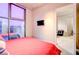 Comfortable bedroom with city views and access to another room at 353 E Bonneville Ave # 385, Las Vegas, NV 89101