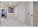 Bright hallway with tile flooring and access to rooms at 353 E Bonneville Ave # 385, Las Vegas, NV 89101