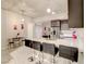 Modern kitchen with island and bar stools at 353 E Bonneville Ave # 385, Las Vegas, NV 89101