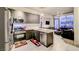 Modern kitchen with stainless steel appliances and an island at 353 E Bonneville Ave # 385, Las Vegas, NV 89101